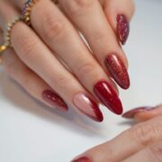 Get festive ready with sparkling cherry-red nails at Stay Flawless Beauty Lounge